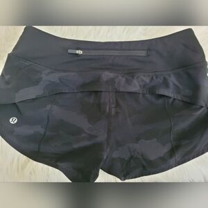 SZ 4 Lululemon short black camo w/ attached underwear, back zipper pocket/flap